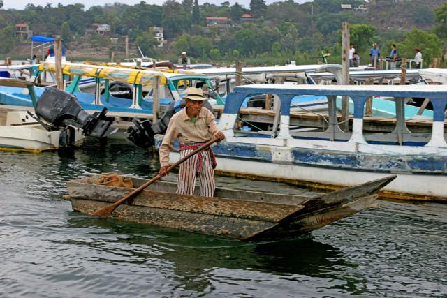 "Heading home" — an old fisherman returns home. Santiago Atitlan, Guatemala 