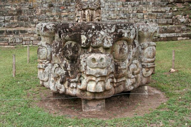 Altar at Stela D.  From this side of the altar we see the skeletal face of a monster representing the Earth.