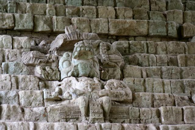 Copán Ruler 12 gazes out at us from the Hieroglyphic Stairway through an open-jawed war mask. His tomb lies inside the Stairway.