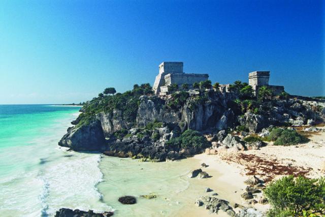 The Temple of Kukulkán in Tulum on the Yucatán peninsula in Mexico.  One of the most famous Mayan tourist sites in the world.